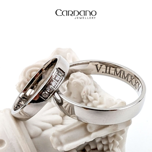 Nowoczesne obrączki z białego złota próby 585 z brylantami.