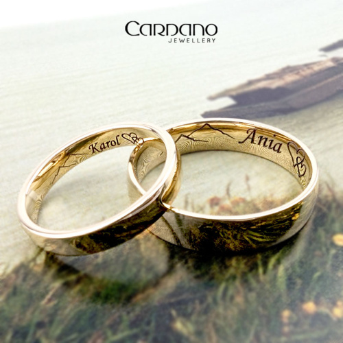 Modne obrączki z żółtego złota 585 z motywem gór.
