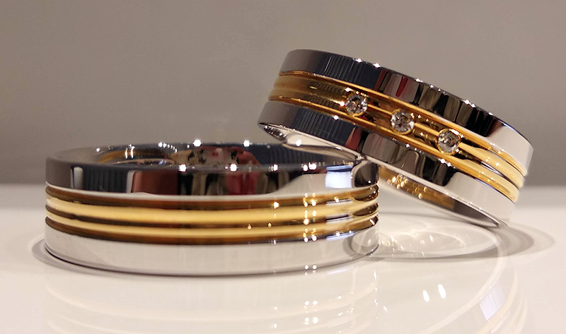 Obrączki ślubne płaskie ozdobione liniami i kamienia 6mm dwukolorowe żółte i białe złoto próba 585