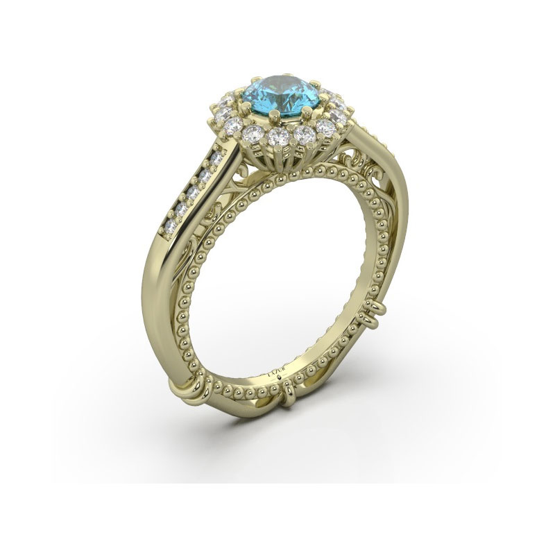 Złoty pierścionek z topazem i brylantami