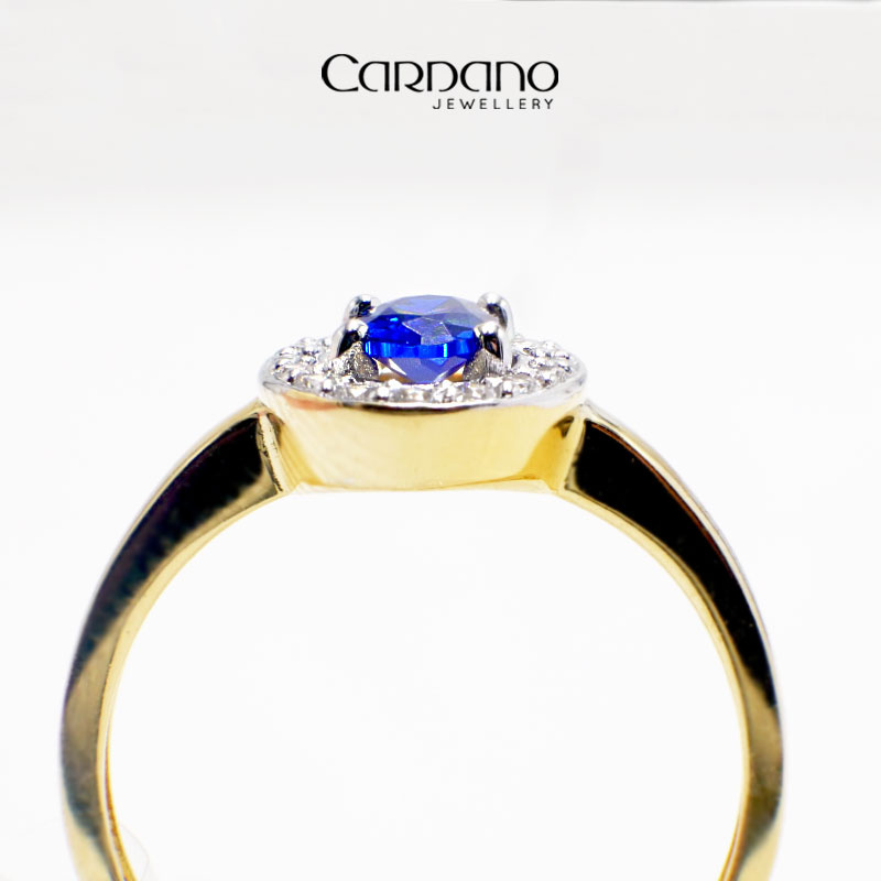 Żółty pierścionek z szafirem i diamentami
