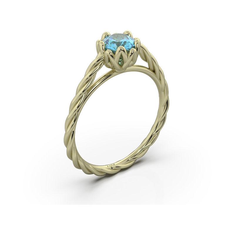 Złoty pierścionek z topazem