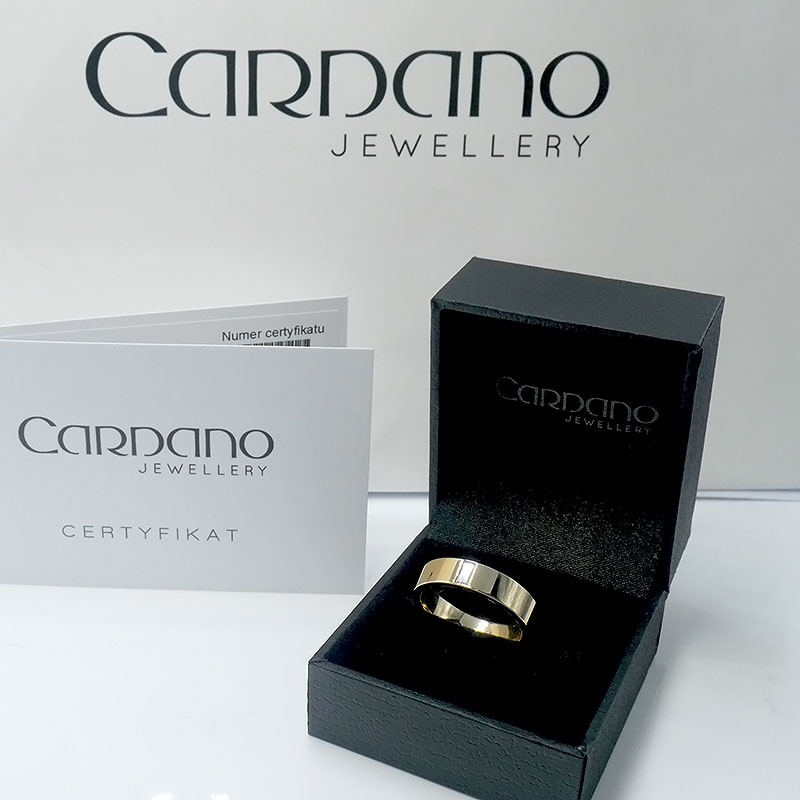 Złota obrączka klasyczna płaska z diamentem prostokątnym 0,11ct